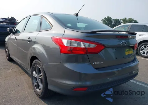 2014 Ford Focus Se z USA, uszkodzony, nr VIN 1FADP3F2XEL344695